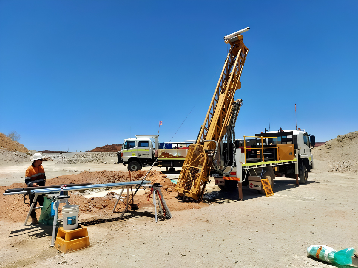 drilling contractors working with tools and equipment to complete a project