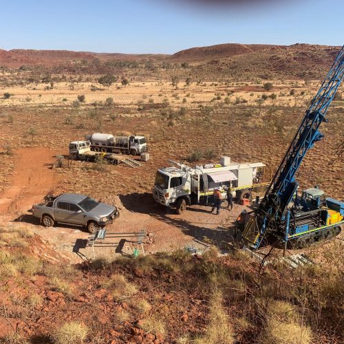 machinery doing exploration drilling in the Western Australian desert.